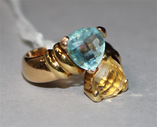 An 18ct gold and two colour topaz ring, size O.